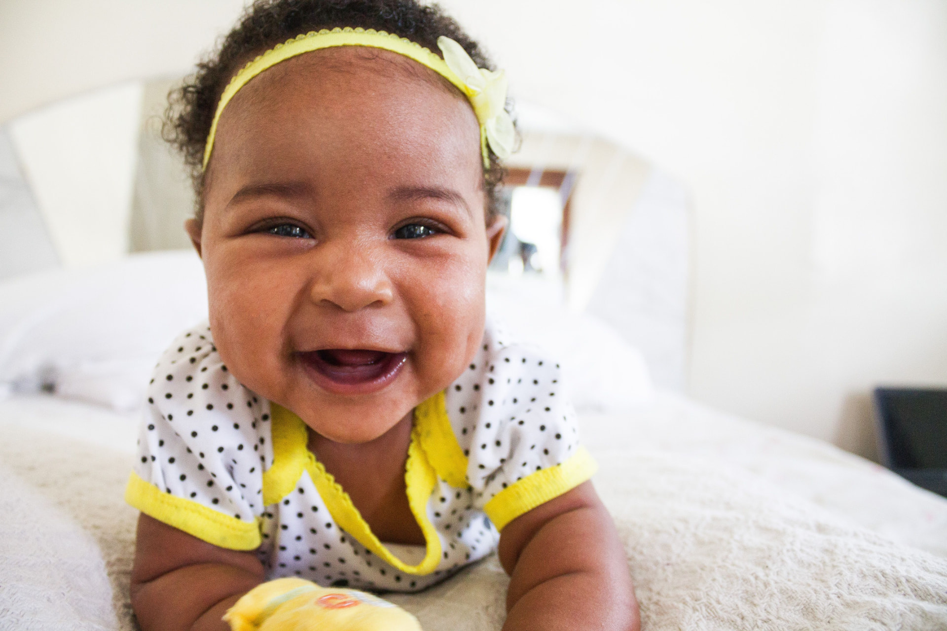 Happy, well-rested baby smiling
